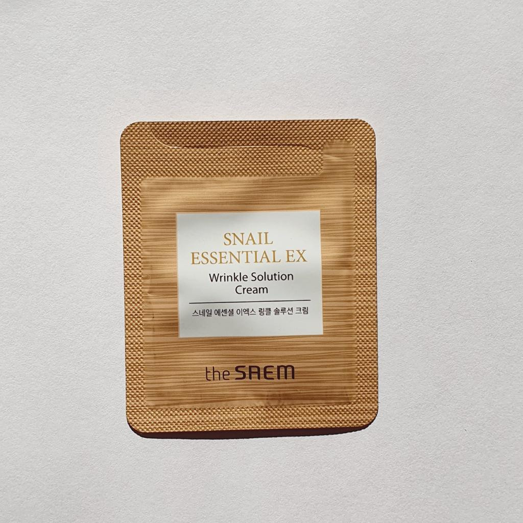 The Saem Snail Essential EX Wrinkle Solution Cream Омолаживающий крем от морщин с муцином улитки.