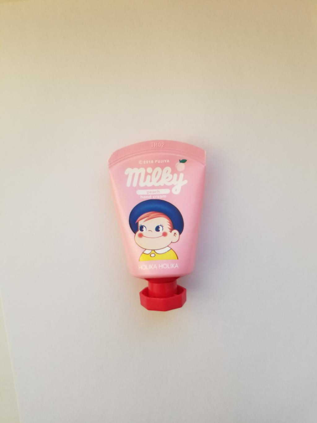 Holika Holika Peko Jjang milky peach Крем для рук.