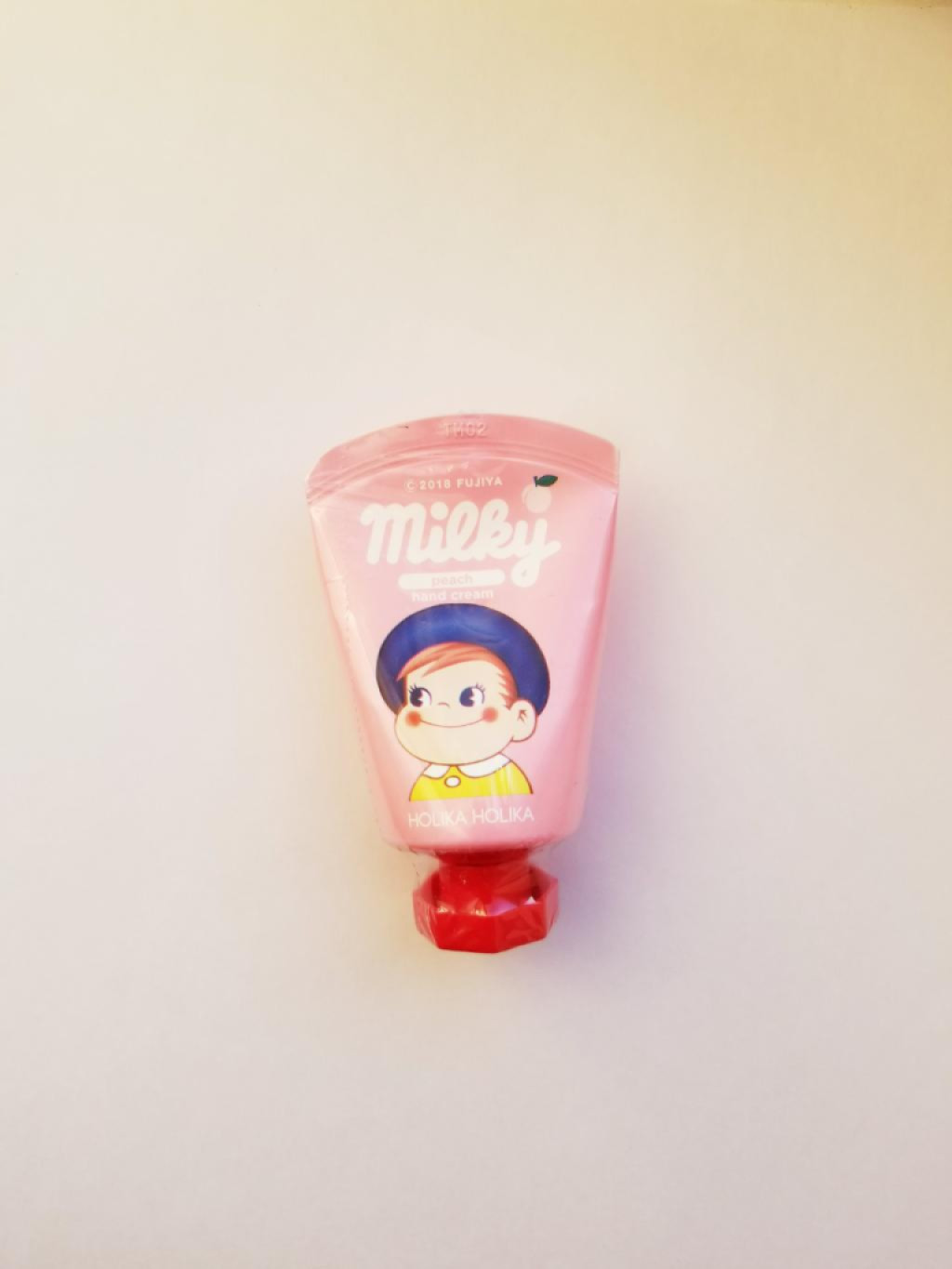 Holika Holika Peko Jjang milky peach Крем для рук.